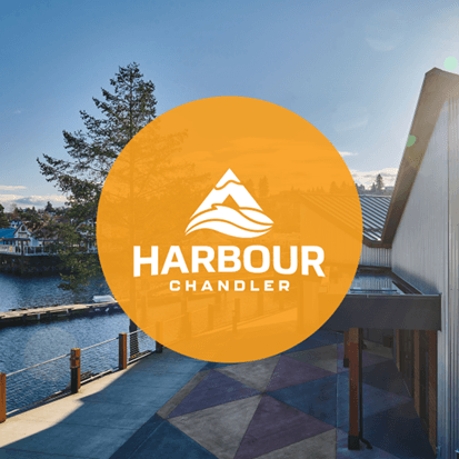 Harbour Chandler logo featuring a mountain and waves over a sunny waterfront and dock.